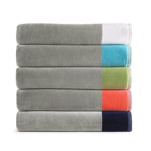 stack of gray beach towels with colored border in white, green, coral, navy, and aqua