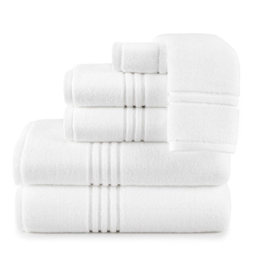 white stack of cotton bath towels